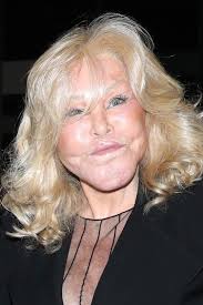 Catwoman' socialite Jocelyn Wildenstein, 82, looks loved up with fiance  Lloyd Klein, 56, at dinner in Paris