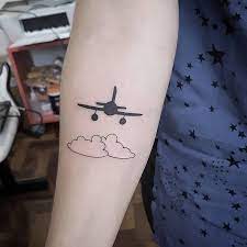 34 Perfect Airplane Tattoo Designs For Travel Lovers Tattoobloq Airplane Tattoos Airplane Tattoo Design Small Tattoos