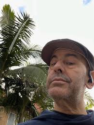 A grey day in Los Angeles. I am being cheered up by listening to Frank  Zappa's "We're Only In It For The Money". What would you listen to?