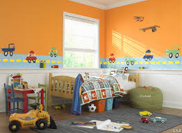 Boyish motifs in red, yellow, and blue create a room that's both cute and mature. Cars And Trucks Room Yellow Kids Rooms Boys Bedroom Colors Toddler Boy Room Themes