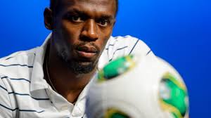 Bolt signs for a Chinese club ... just maybe not the one you think as  Jamaican sprinter joins Robbie Williams to do it for the kids