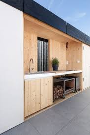 With full aluminium frames and cabinets, 5mm tempered glass doors and granite bench tops, an alfresco outdoor kitchen won't warp or rust and can withstand anything new zealand's weather can throw at it. Plywood Never Looked So Good Modern Outdoor Kitchen Outdoor Kitchen Cabinets Outdoor Kitchen