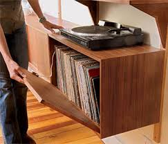 Her tool belt has this awesome entertainment center plan that has plenty of space and even deep drawers located on both sides of the bottom. Free Plan Mid Century Modular Wall Unit Finewoodworking