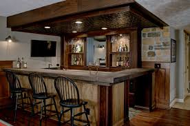 A home bar will show its versatility across several different hosting styles. Custom Basement Bar Rustic Basement Columbus By Dave Fox Design Build Remodelers Houzz