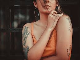 A scarf can cover up a tattoo on your neck or upper chest. 13 Adorable Small Tattoos You Can Hide Society19