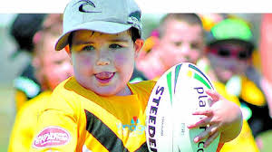 Kids get chance to soar like Falcons at footy game