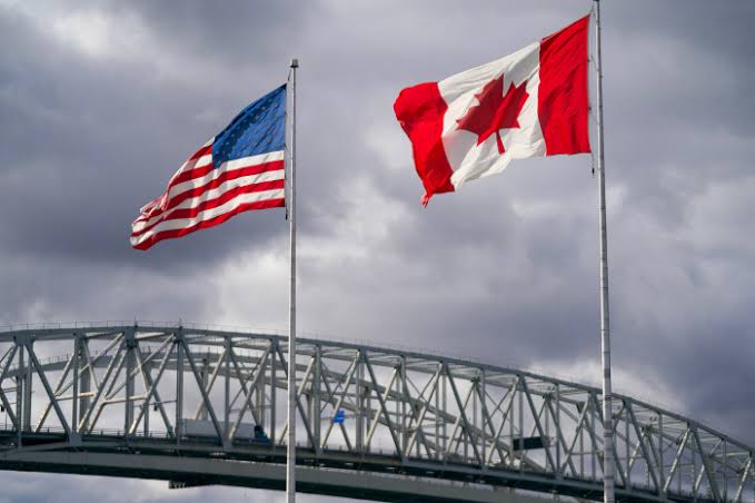 US-Canada trade war escalates as Trump announces 50% tariffs on vehicles and parts from Canada starting January 1, 2027; Carney vows dollar-for-dollar retaliation