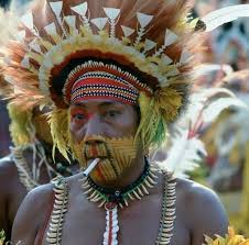 Chocolate isn't much use in the steamy jungles of Papua New Guinea, so Easter trees at the front of churches are decorated with sticks of tobacco and cigarettes instead. These are handed