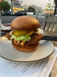 Delivery options include a chicken sandwich, tenders, a shrimp po' boy and a fried chicken salad. Nashville Hot Fried Chicken Sandwich Comeback Sauce B B Pickles Iceberg Lettuce Picture Of Son Of A Gun Los Angeles Tripadvisor