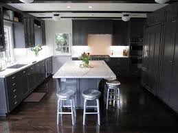 Okay, so technically this white kitchen with dark flooring isn't to bring this look into your own home, pair modern, polished chrome hardware with a warm, vintage accent rug and dark island for a balanced. Grey Cabinets Dark Wood Floors Novocom Top