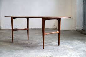 Once you've established a solid sofa for your living room, the coffee table is arguably just as important. 60s Mid Century Coffee Table Teak Danish Vintage Table Zeitflair