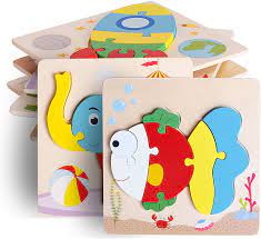 Plus, the name of each object is printed right on the puzzle board, with the target letter highlighted—so as children fit the chunky pieces into place, they practice sounding out words and increase vocabulary, too! Amazon Com Umtoy Wooden Puzzle Jigsaw Toy 8 Pack Puzzle Toys For Toddlers 2 3 4 Years Old Boy And Girl Birthday Gift Educational Kids Toys Toys Games