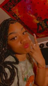 Pretty brownskin teen girl with soft locs