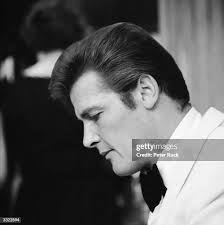 216 Roger Moore The Saint Stock Photos, High-Res Pictures, and Images