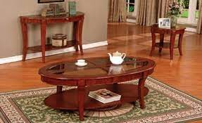 If you have a material of choice, look through a wide range of tables in different materials like marble, glass, wood, and metal. 4227 3 Pc Cherry Finish Wood Contemporary Style Oval Coffee Table And End Tables With Glass Inserts