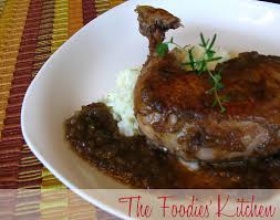 Soak chicken thighs and drumsticks in buttermilk, then coat in paprika and cayenne batter and fry. Chicken Thighs With Fig Sauce