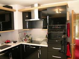 مطابخ صغيرة باللون الاسود Black Kitchen Cabinets Modern Black Kitchen Kitchen Cabinets