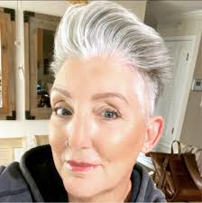 What hair styles and stylists are recommended for long hair with layers and  bangs?