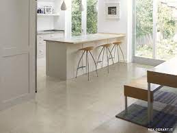 Wallandtile.com offers this large format collection in these tiles in large sizes 18x36 inches, 16x24 inches, 24x24 inches 7x48 inches and 16x32 inches. Very Light Cream Gray Kitchen Floor Tiles Complement Wooden Floors In Rest Of House And Grey Splashbac Kitchen Floor Tile Kitchen Flooring Grey Kitchen Floor