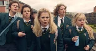Derry Girls (2018) is a show set in 90s Ireland, about a group of mean girls  who are fucking menaces to their city and society as a whole! But they  never get