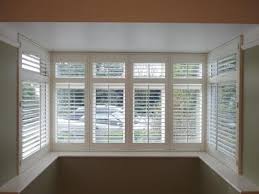 Measure the full width of the bay from side to side and order this blind as 'recessed fitting'. Plantation Shutters For Bay Windows