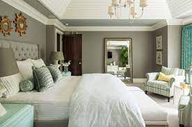 Give your bedroom a hotel feel with cozy white sheets and an assortment of complementary throw pillows. 25 Absolutely Stunning Master Bedroom Color Scheme Ideas