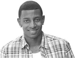 Coach Willie Maye celebrates winning the putting challenge at the 4th DJ  Henry Dream Fund Golf Classic