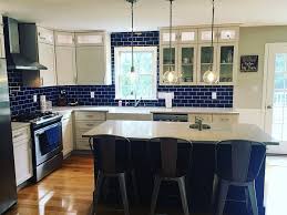 Simple, flat glass backsplashes can also provide an elegant focal point that suits modern kitchens with a classic look. Cobalt Glass Subway Tile Kitchen Design Kitchen Renovation Kitchen Remodel