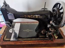 Image result for singer 28k