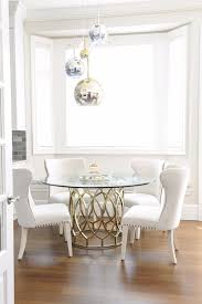 Round glass dining table metal base. 15 Glass Dining Tables For A Statement Shelterness