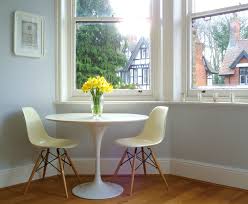 Having That Morning Cup Of Tea With Your Loved One On An Elegant Table Could You Ask For More Tuliptabl Oval Table Dining Tulip Dining Table Dining Table