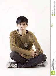 Young Man Sitting On The Floor Cross Legged Man Sitting Man Sitting Cross Legged Cross Legged