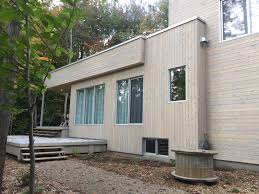 Projet Realise Avec Les Revetements De Bois Adirondack Cedre Blanc Du Quebec Noueux Avec Teinture De Vieillissement Outdoor Structures Outdoor Structures