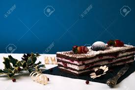 Mar 31, 2015 · preheat the oven to 350° f and lightly spray a 9x13 baking pan (or dish) with nonstick cooking spray. Strawberry Christmas Cake With Fresh Strawberries Souffle Cream And Chocolate Crumbs With Christmas Decorations Fir Cones Holly Tree And Berry On Blue Background With Copy Space Stock Photo Picture And Royalty Free