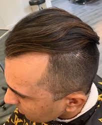 In a traditional undercut, the hair is usually parted, but slicking the hair back is a common stylistic twist. Undercut Hairstyle And Haircut Faq Guide Men S Hair Forum