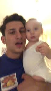 Papà E Figlio Che Cantano in Macchina