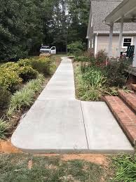A concrete contractor builds or repairs concrete driveways, concrete foundations, concrete slabs and patios, concrete sidewalks and steps, walls, and other concrete work. 336 613 5356 Call Map Hours Home About Services Concrete Patios Concrete Driveways Swimming Pools Other Services Stamped Concrete Concrete Slabs Sidewalks Service Areas Greensboro Concrete Company Summerfield Nc Concrete Company