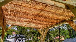 Thin Strips Of Wood 3 Attached To Pergola Top With Bamboo Fencing Pergola Bamboo Fence Patio Shade