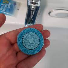 How to safely remove dust from silicone faces?