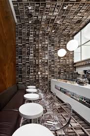 D E C E P T O L O G Y Sideways Optical Illusion Coffee Shop Cafe Interior Design Coffee Shop Interior Design Coffee Cafe Interior