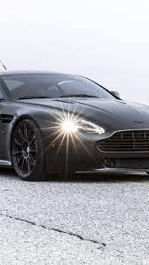Aston Martin Vantage Black Bmp Iphone 5s Wallpaper Aston Martin Vantage Aston Martin Cars Aston Martin