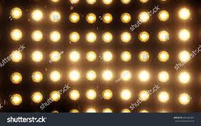Bright Flood Lights Background With Particles And Glow Gold Tint More Color Options Available Light Background Images Lights Background Cool Wallpapers Girly