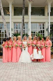 Dusty miller, white calla lilies, coral dahlias, & garden roses garden roses, dahlias, calla lilies Coral Wedding Coral Bridesmaid Dresses Paired With Coral And Green Flowers 2019 Colorsbridesmaid