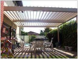 Louvered Patio Covers Can Be Placed On Top Of Existing Pergolas Give Us A Call And Find Out More Pergola Patio Pergola Pergola Attached To House