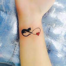 Tattoo Black Cat Infinite Heart Lovecats Arm Girlwithtattoos Tattooedgirl Tatuagem Tatuagempret Black Cat Tattoos Cat Tattoo Designs Cute Cat Tattoo