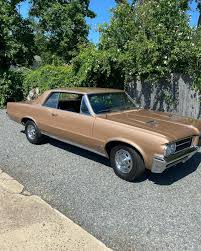 Image result for Saddle Bronze 1964 Pontiac