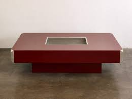 The designer created the iconic rectangular coffee table with a wood structure and metal covering (the 1970s). Alveo Coffee Table By Willy Rizzo Espacemoderne