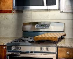 It is used to cut through material, very often wood though sometimes metal or stone. Cutting Board And Cooktop Cover Wine 27 Kitchen Dining Home Living Kromasol Com