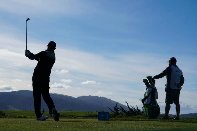 Pro and caddie