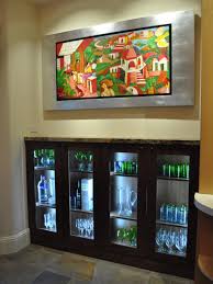 Whether it's undercabinet lighting for your kitchen or shining the light in cabinets or display cases for your collectibles or business products, cabinet lighting adds an heir of elegance and ambiance to. Kitchen Display Cabinet With Glass Doors And In Cabinet Lighting Hgtv